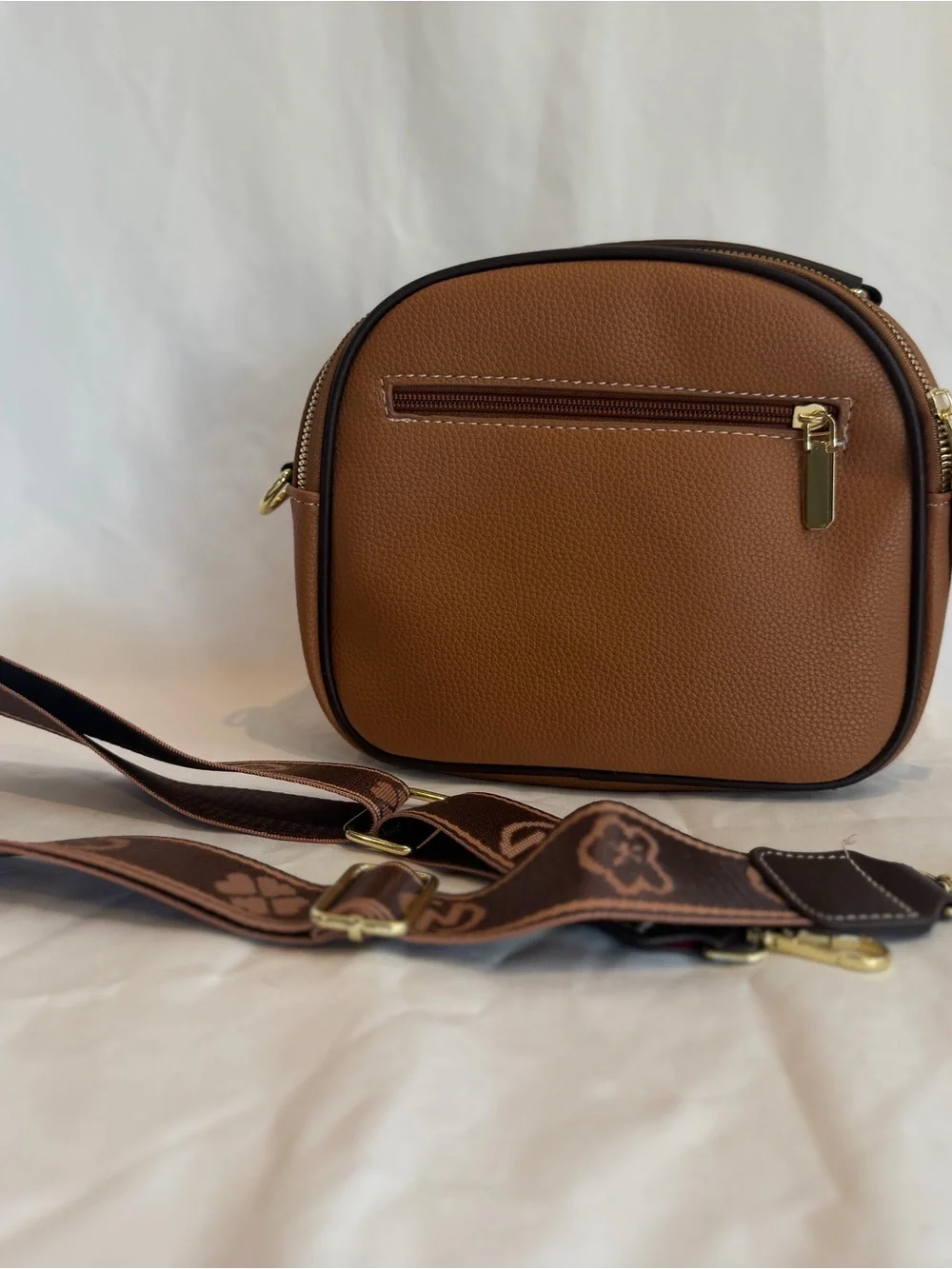 K-Emblem Tan Pebbled Leather Crossbody Bag with Patterned Strap